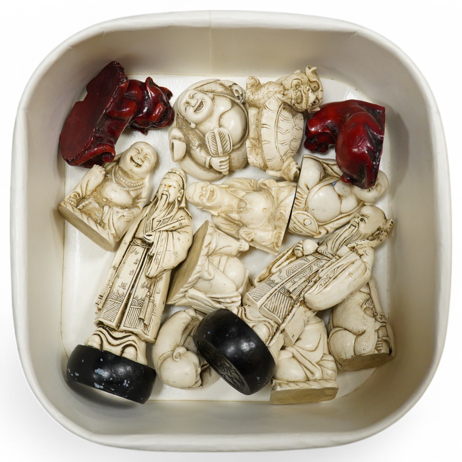 A quantity of Chinese resin figures, two stained, tallest 10cm. Condition - varies